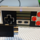 It costs twice as much, but this is the best wireless controller for your Mini NES
